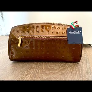 Arcadia patent leather bronze travel makeup bag